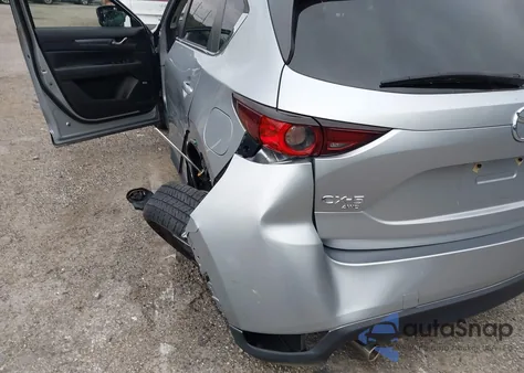 2021 Mazda Cx-5 Touring z USA, uszkodzony, nr VIN JM3KFBCM4M1385328